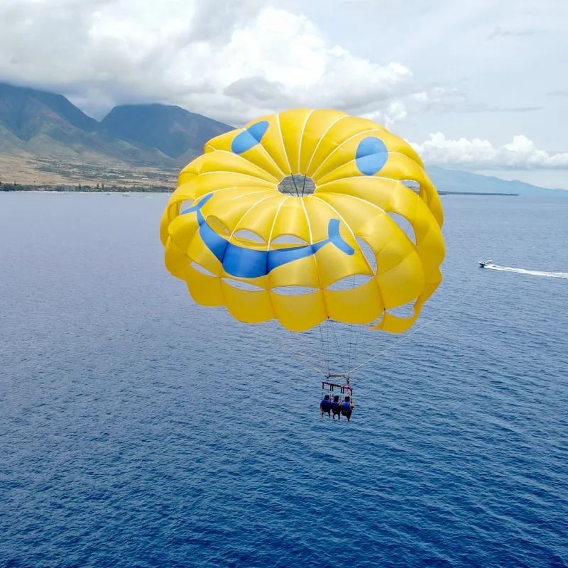 A parasail canopy against the blue water off Kaanapali Beach
